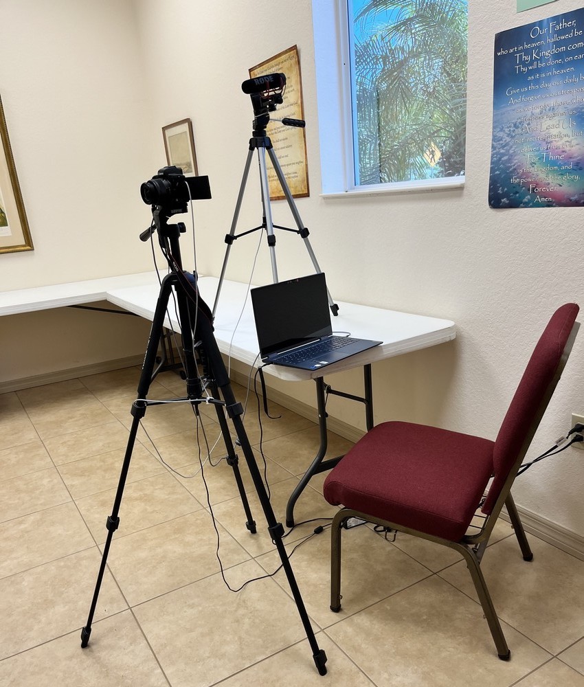 Photo of Computer and Cameras on a tripod